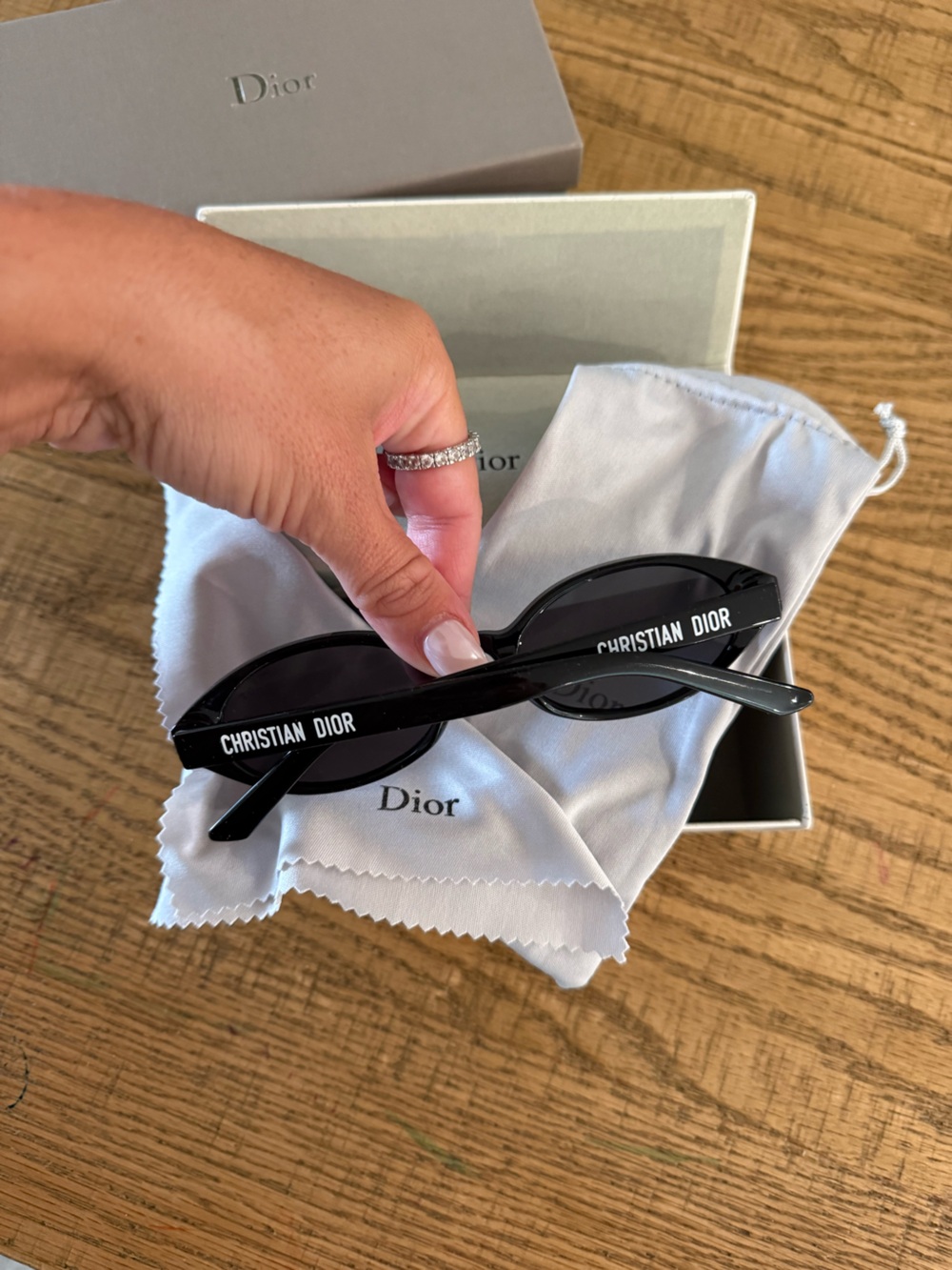 Dior Black Oval Sunglasses with Gold Star Accents - Picture 3 of 11